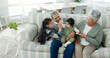 © peopleimages.com - Grandparents, relax and grandchildren on sofa for high five, bonding and family support in living room. Grandma, grandpa and grandkids for love together, people or development in house with fun