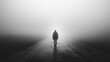 © BonzEarthsnapper - Silhouette of a person walking away down a foggy street, isolation, farewell moment