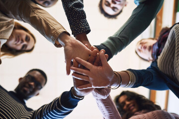 Poster - Hands, stack and student friends for motivation, smile or solidarity for goals, exam and education. People, huddle and scrum in group, portrait and study with low angle in library, hall or university