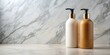 © lapeepon - Shampoo and conditioner bottles on a marble countertop, hair care, hair products, hair treatment, beauty, hygiene, clean