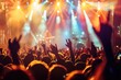 © Igor - cheering crowd at rock concert in front of bright lights