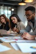 © Shooting Star Std - A multiethnic executive team evaluating company performance in a modern meeting room, going through performance reports and graphs, after a performance review