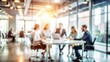 © N7 - Creative Teamwork Office Blur - Blurred background showcasing creative teamwork in an office.
