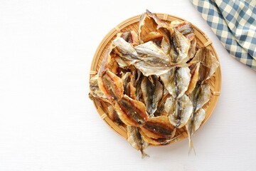 Dried sweet fish on a white background