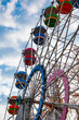 © altana_studio - Ferris wheel amuse entertainment and sightseeing in autumn or fall season park outdoor. Amusement ride