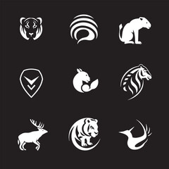 Wall Mural - Set of nine animal logos on a black background.