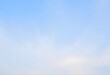 © Kdhtdg - Clear blue sky with a single, fluffy white cloud drifting across it