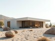 © Chanon - A modern minimalist house with clean lines, large floor-to-ceiling windows, and a flat roof, surrounded by a desert landscape with cacti and rocks