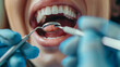 © lukshan - Photo of a Young Female Dentist with a Smiling Female Patient