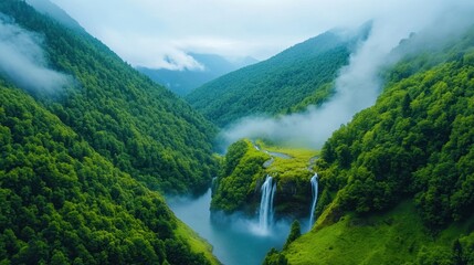 A scenic view of a waterfall in a tropical rainforest, with misty oxygen-rich air surrounding the area