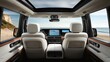 © Екатерина Чумаченко - The SUV has a large rear space, three seats, all-white leather interior, center console and flat-panel touch screens on both sides, a head-up display above one screen