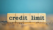 © Best_Seller - A credit card symbol made of wood blocks. The blocks spell out 'credit' and 'limit'.  The background is a calming blue. This image represents the idea of credit limits in business.