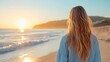 © cloud7days - Blonde woman walking along the sandy beach at sunset, with the ocean waves gently crashing around her.
