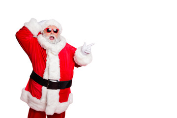 Wall Mural - portrait of his he nice attractive cheerful cheery glad stunned bearded santa showing ad advert copy