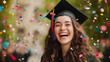 © Yuwarin - A happy woman in a graduation with confetti