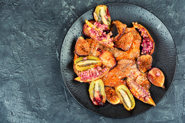 Canvas Print - Meat tenderloin baked with fruits.