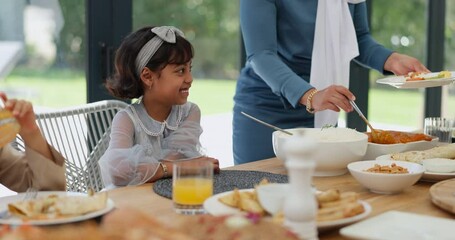 Wall Mural - Muslim, family and children with food or dinner at dining table for eid, islamic celebration and hosting. Ramadan, culture and people eating at religious gathering with curry, discussion or happiness