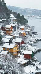 Canvas Print - A group of houses sitting on top of a snow covered hillside