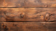 © Natalia - Close-up of rustic wooden planks showing natural wood grain and knots. The surface has a warm brown tone with unique textures, suitable for backgrounds or textures.
