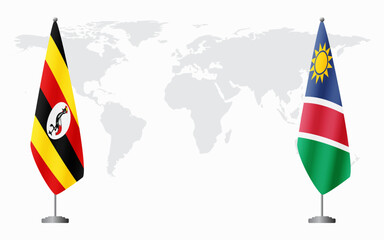 Uganda and Namibia flags for official meeting against background of world map.