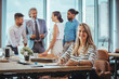 © Dragana Gordic - Successful Team Meeting in Modern Office Environment
