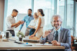 © Dragana Gordic - Confident Business Leader in Modern Office Meeting