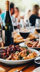 Wall Mural - A plate of food and a glass of wine on a table