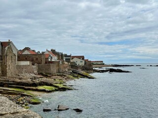 A scenic coastal view with old stone homes 