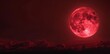 © Avr Di - An ethereal red moon in a cloudless night sky illuminated by a large closeup of a full moon in a glowing fantasy setting. Cinematic mystery vibe. Red sky and moon.