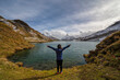 © Noppasinw - Grindelwald First Switzerland nature landscape at Bachalpsee Lake (Bachsee) with woman tourist