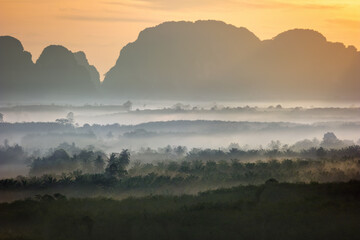 Mountain sunrise view at Din Deang Doi viewpoint with tropical forest, Krabi Thailand nature landscape