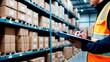 © ANDREY PROFOTO - Warehouse worker checking inventory with clipboard