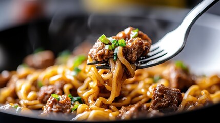 A steaming dish of beef and noodles topped with freshly chopped chives, presented on a fork, highlighting the inviting and appetizing qualities of the warm, homemade meal.