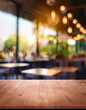 © anandart - Empty wooden table in cafe setting ideal for product display featuring blurred bokeh background creating abstract for bar restaurant or coffee shop interior space for celebration business or lifestyle
