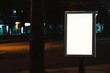 © Almultazam - Blank Billboard Ad Space on a City Street at Night