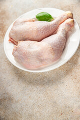 chicken meat legs raw poultry flesh on the bone gourmet fresh meal food snack on the table copy space food background rustic top view