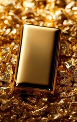 A gleaming gold bar resting on a bed of shimmering gold flakes, symbolizing wealth and luxury.