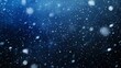 © Maria Mikhaylichenko - Mesmerizing snowfall against a dark night sky, creating a magical winter atmosphere with swirling flakes illuminated against the deep blue backdrop.