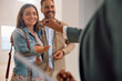 © Drazen - Close up of happy couple receiving keys of their new home from real estate agent.