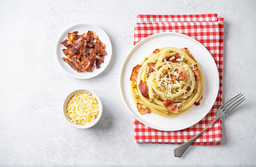 Fried bacon green peas pasta in a plate