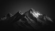 © indyntk - High contrast black and white image of rugged mountain range with dramatic shadows and highlights on a solid black background