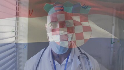 Poster - Animation of flag of croatia over african american male doctor in face mask