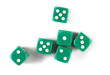 Green gambling dice, macro isolated on white background, top view