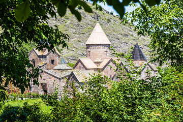 Wall Mural - Goshavank monastery in frame of green leaves