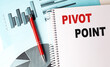 © Iryna - Pivot point concept on a notebook with business charts and a red pen on a desk