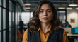 © Arceli - Confident Hispanic female in tech startup office background
