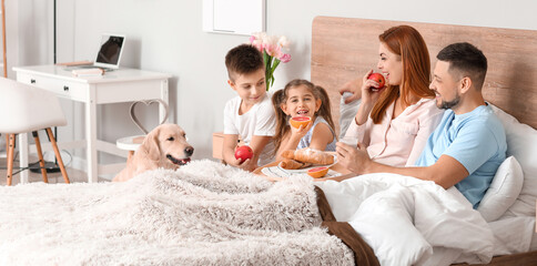 Sticker - Happy family having breakfast in bedroom at home