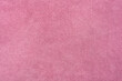 © Thodsaphol Tamklang - Texture of pink velvet fabric