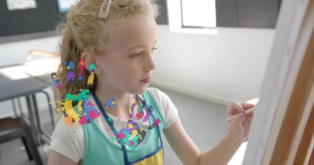 Poster - Painting on canvas, girl surrounded by colorful splashes animation