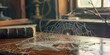 © AkuAku - An untidy spider web weaves its way across a desk